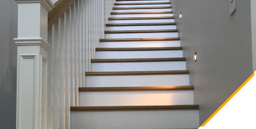 A newly rewired staircase with lighting