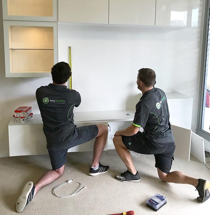 The Easy Switch Electrical team performing an electrical installation