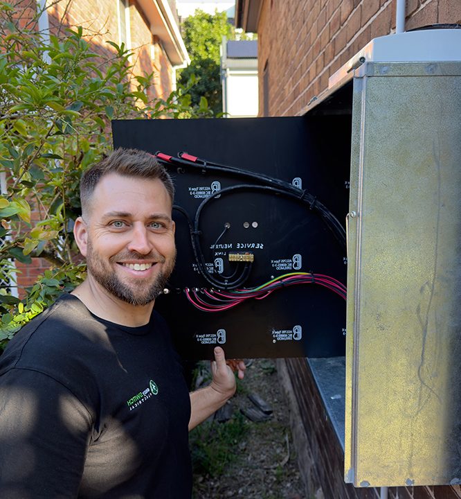 A sydney electrician upgrading a switchboard