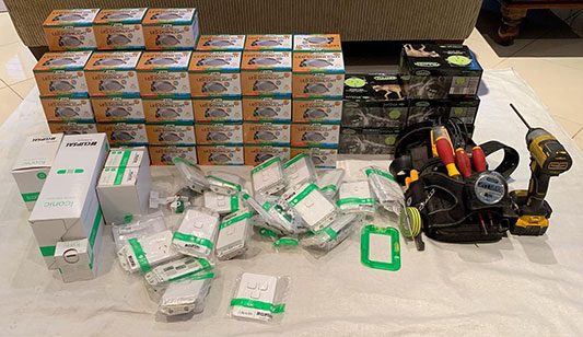 An Easy Switch Electrical electrician rewiring a lighting fixture