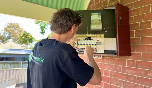 An Easy Switch Electrical electrician rewiring a switchboard
